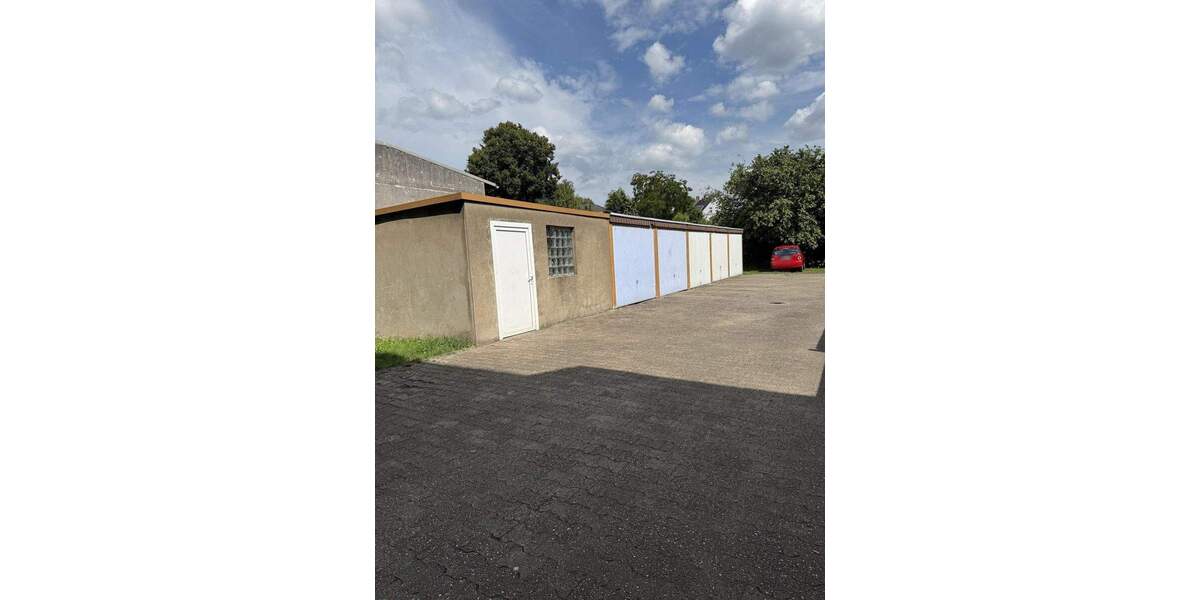 2 Eigentumswohnungen mit Garagen und Garten 5 zimmer