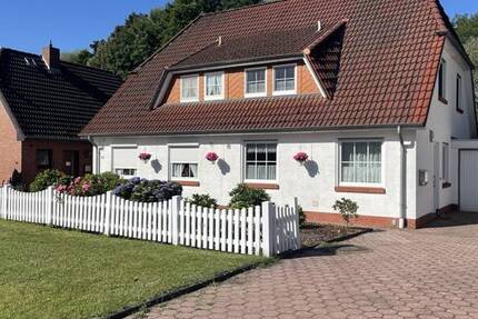 Gepflegte Doppelhaushälfte mit Garten und Garage am Rekumer Deich.