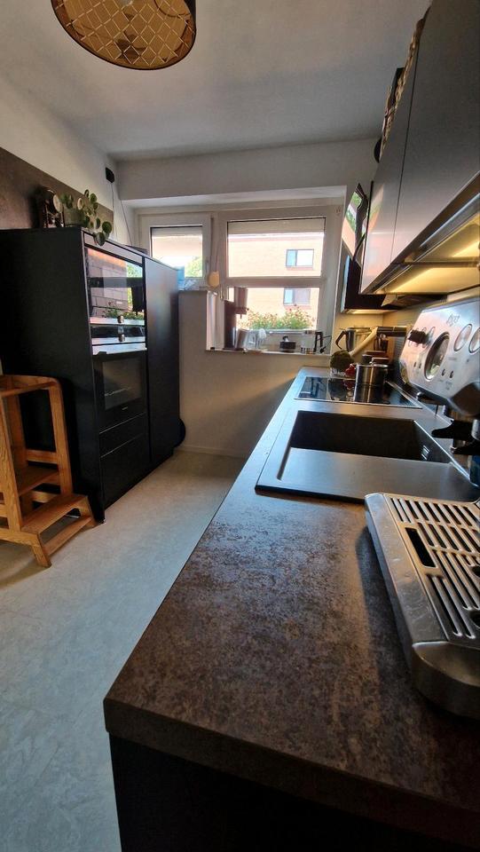 Wohnung im Reihenhausstil mit eigenem Eingang, Garten und Garage