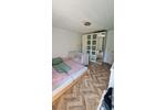 Wohnung im Reihenhausstil mit eigenem Eingang, Garten und Garage