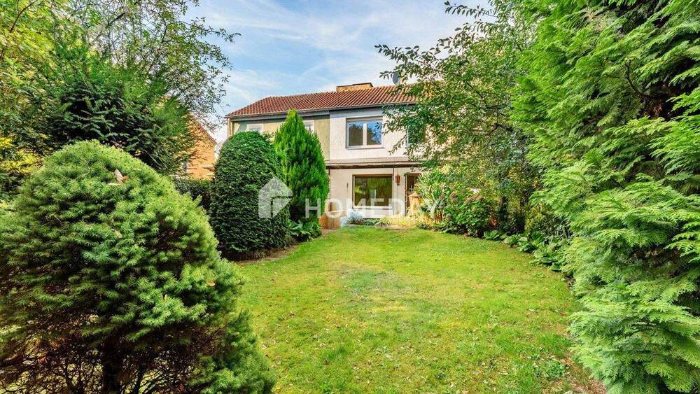 Charmante Doppelhaushälfte mit Potenzial - ruhige Lage, Gartenidylle und viel Gestaltungsspielraum 5 zimmer