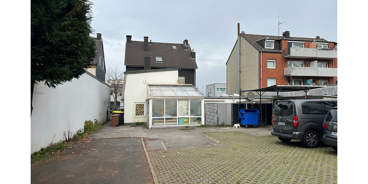 Investorenobjekt mit 3 Wohnungen, 2 Ladenlokalen und Erweiterungsmöglichkeiten 1 zimmer