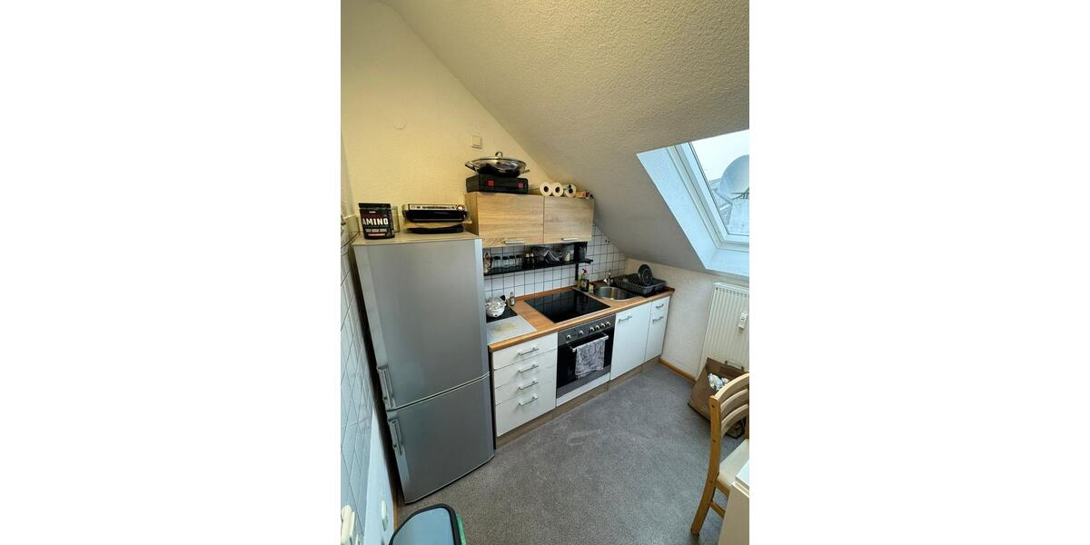 Möblierte Dachgeschosswohnung mit Dachterrasse 2 zimmer