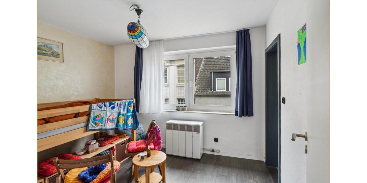 Mehrfamilienhaus mit Gewerbeeinheit – attraktive Kapitalanlage in zentraler Lage zimmer