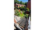 Wohnung im Reihenhausstil mit eigenem Eingang, Garten und Garage