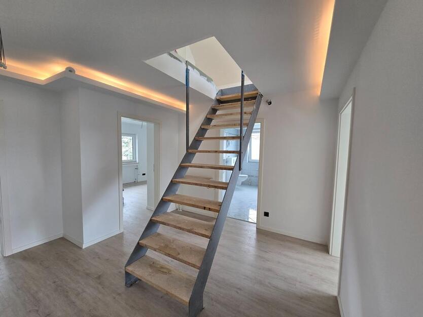 Modernisierte Maisonette-Wohnung mit Garten in GrafenwaldKirchhe