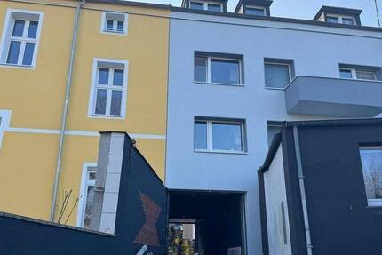 Mehrfamilienhaus mit Gewerbeeinheit im Hof am Innenhafen 1 zimmer