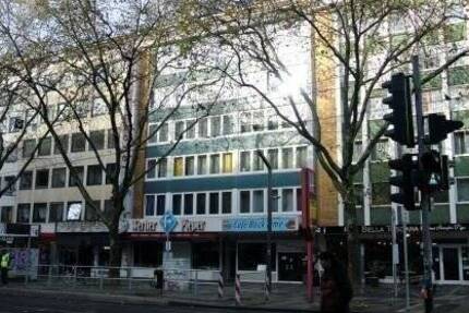 Citylage Mülheim-Mitte Wohn-und Geschäftshaus-Mehrfamilienhaus mit 11 Wohnungen und zwei Gewerbeeinheiten