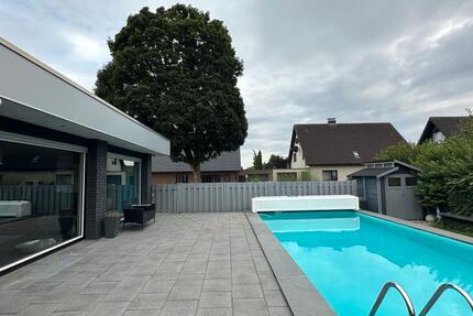 Leben auf einer Ebene-Bungalow mit Garage, Pool & Wohlfühlgarten zimmer